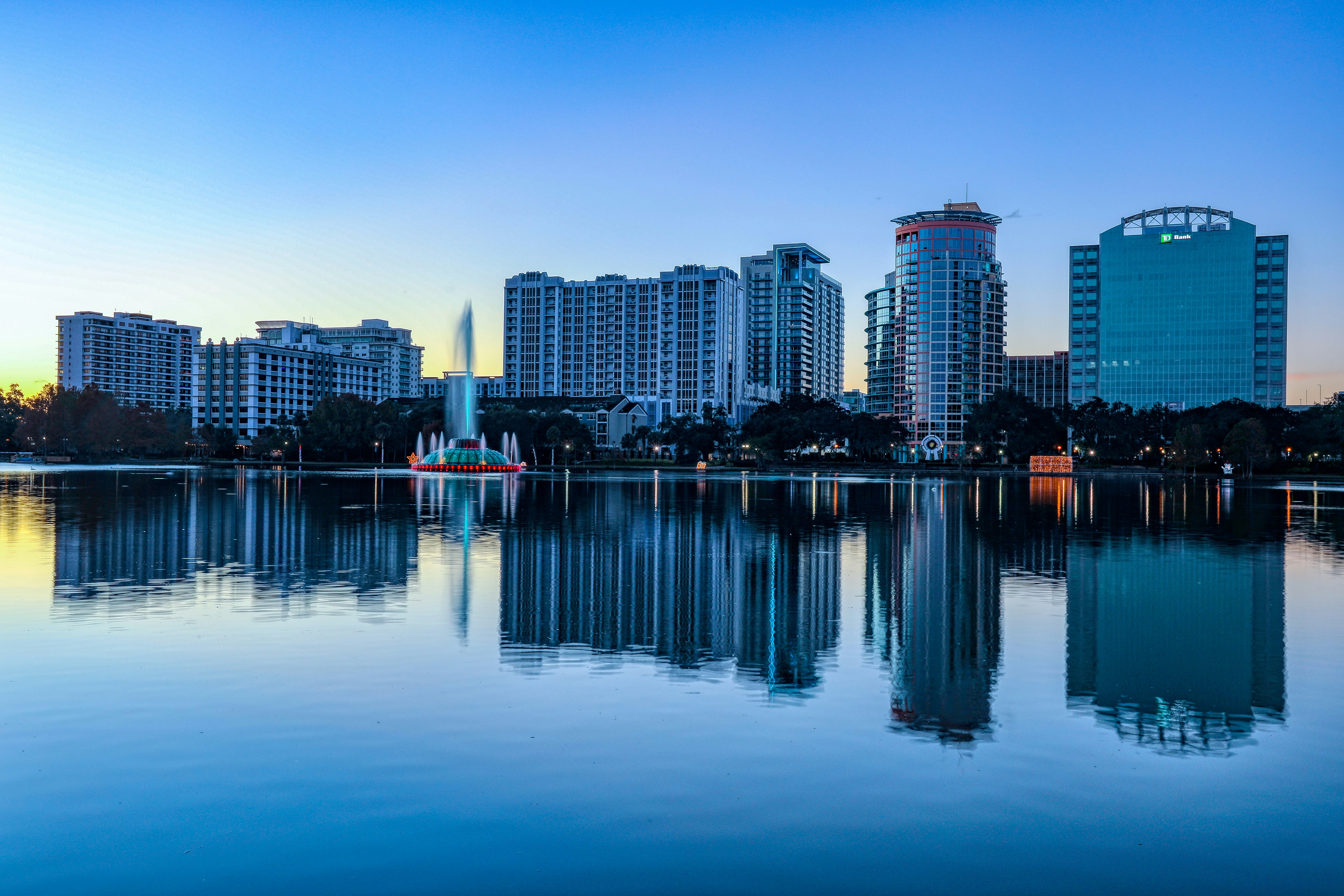 city skyline across body of water during daytime